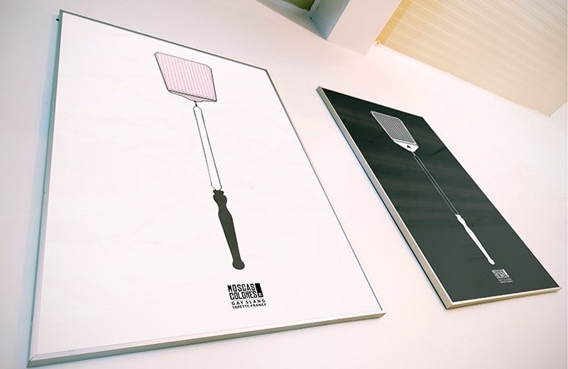 Tapette | Gay Dictionary, France Photograph of two Tapette drawings hanging on a wall.