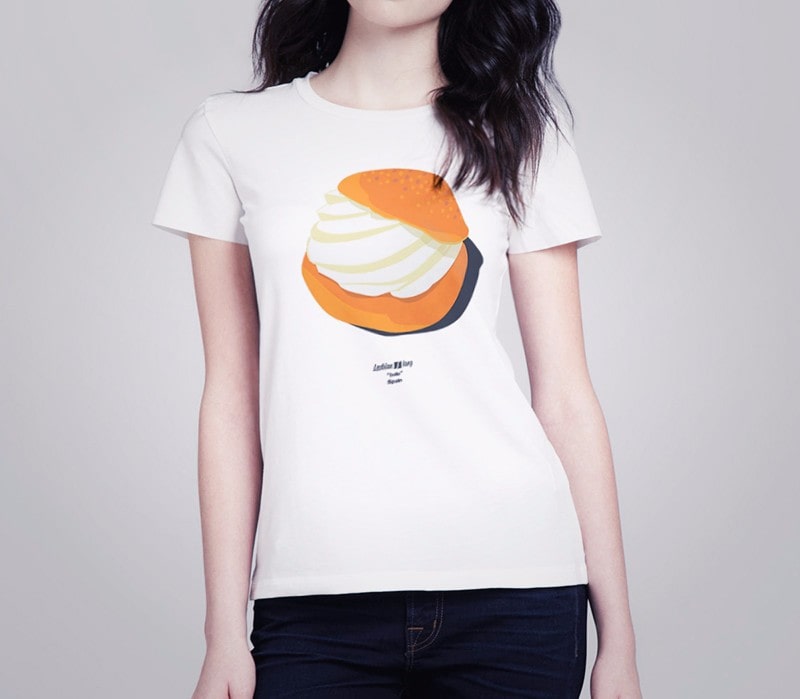 Close-up photograph of a girl wearing a white shirt with the Bollo drawing.