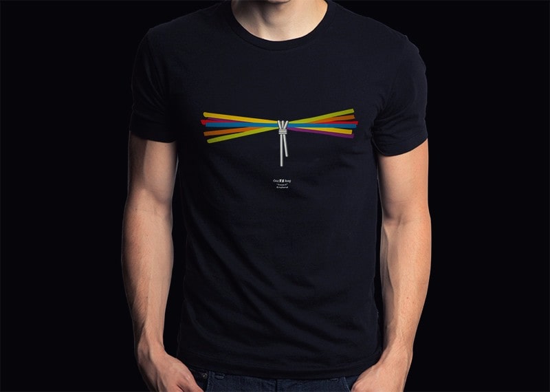 Short shot photograph of a boy in a shirt with the Faggot illustration.