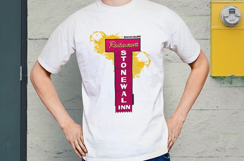 Photograph in short shot of a boy in a T-shirt with the drawing about the Stonewall riots, the origin of LGBT pride.