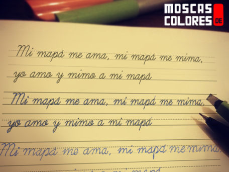 Calligraphy notebook with the text "My moppa loves me, my moppa pamper me, I love and pamper my moppa".