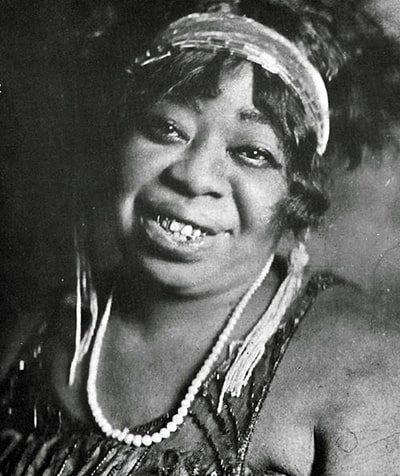 Black and white photograph of Ma Rainey, a Bull-dyking woman